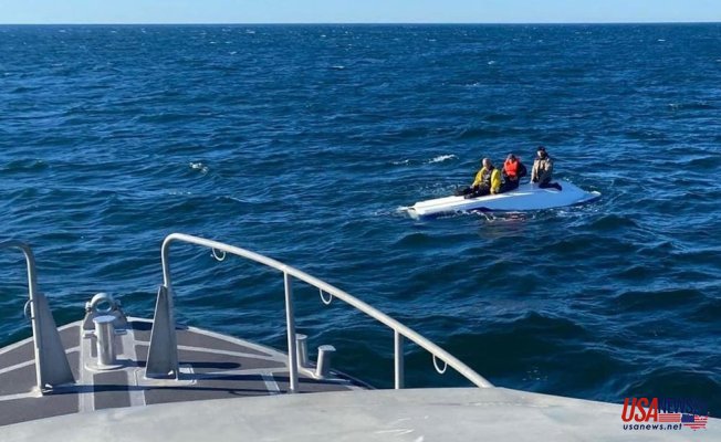 3 fishermen rescued after boat capsizes