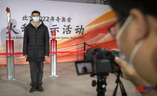China orders 3-day Olympic torch relay in response to virus concerns