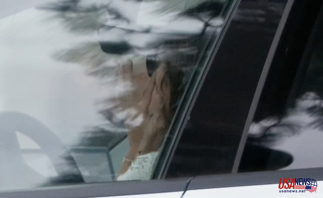 Tara Wilson, Chris Noth's spouse, is seen in tears in her car in Los Angeles.
