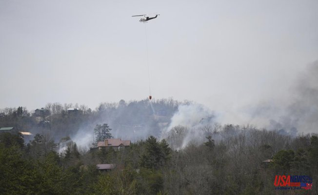 Crews try to control wildfires near Smoky Mountain