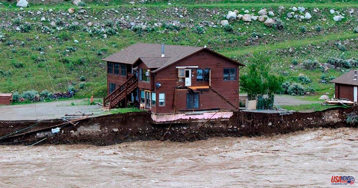Officials from Yellowstone assess the damage caused by historic floods