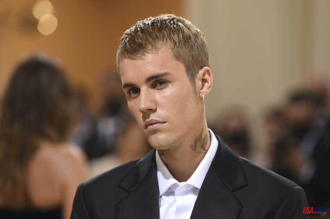 Justin Bieber delayed his tour after a disorder that paralyzed half his face made it impossible to travel.