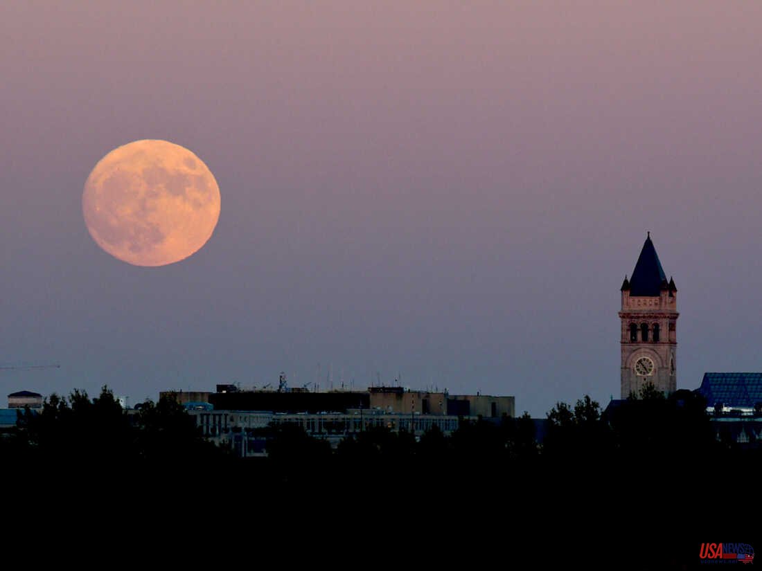 On Tuesday, a strawberry supermoon will rise. Here are some ways to keep an eye on it.