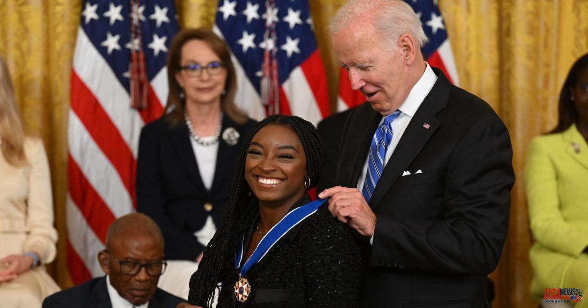 Biden presents the Medal of Freedom to Simone Biles and Gabrielle Giffords, as well as 14 other recipients
