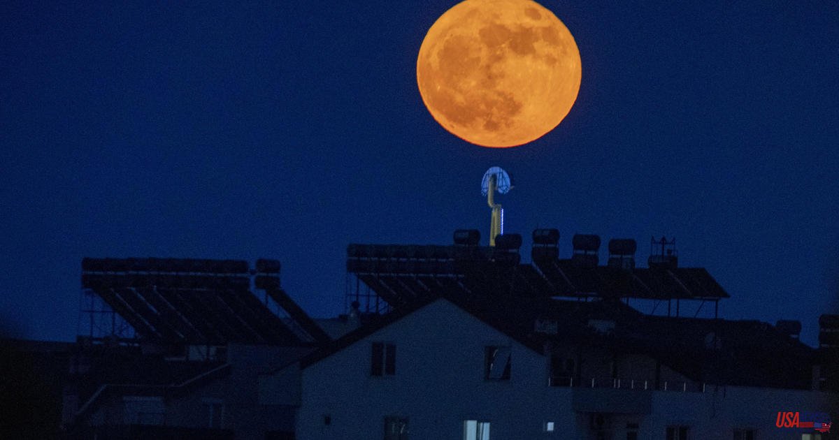The world's sky is lit up by June's Strawberry Supermoon