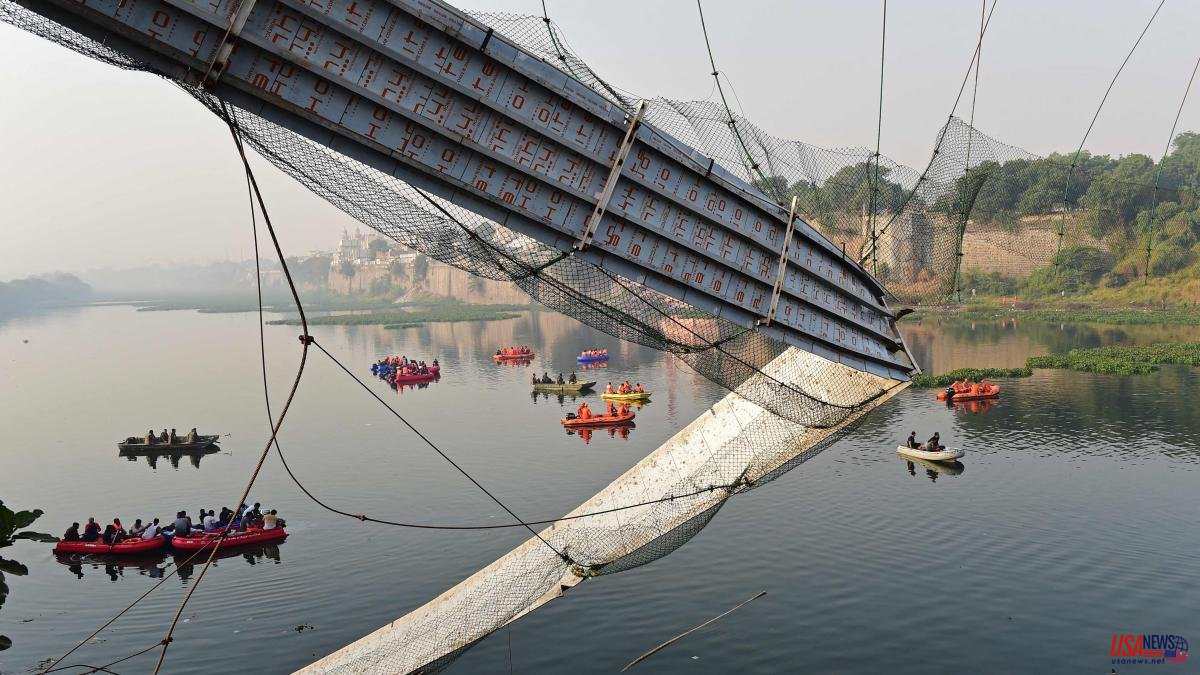 At least 132 dead in suspension bridge collapse in India