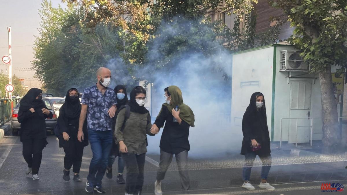 Protests in Iran spread through universities