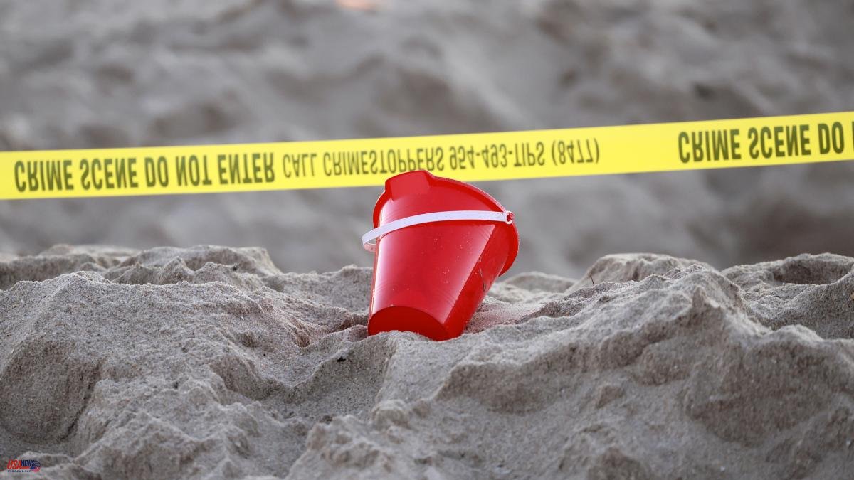 A girl is dead and a boy is in serious condition after falling into a hole on a Florida beach