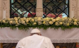 Francis prays at the tomb of Celestine V, the first pope to resign