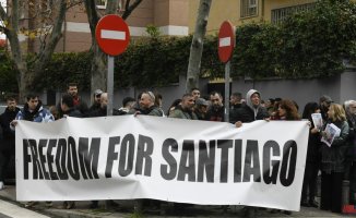 Relatives and friends of Santiago Sánchez gather in front of the Iranian embassy in Madrid to demand his release