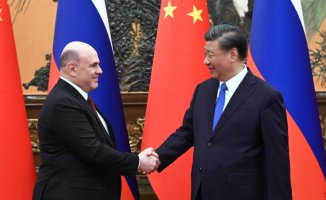 China strengthens economic ties with Russia after G-7 summit