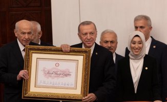 Erdogan swears five more years as president