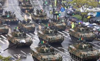 Tanks roll through Seoul in South Korea's first military parade in a decade