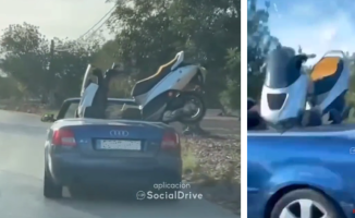 Can a motorcycle be transported with a convertible car? Yes, but not like this
