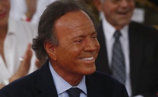 Why did Julio Iglesias and his son Enrique Iglesias distance themselves?