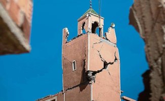 The minaret of the Koutoubia mosque and the red walls of Marrakech suffer damage