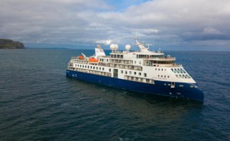 A luxury cruise ship with 200 people runs aground in a remote Greenland bay
