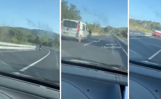 A reckless motorist crashes into a truck after repeatedly invading the opposite lane