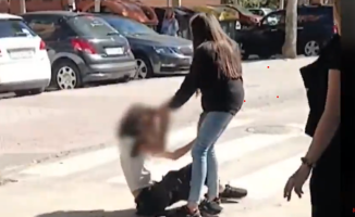 A 12-year-old girl was beaten outside a school in Madrid and her classmates shouted "kill her, kill her"