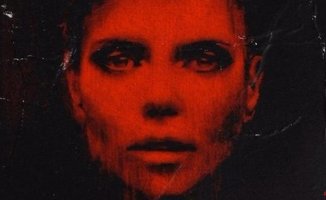 Heidi Klum gives clues to the terrifying costume she will wear this Halloween with a nightmarish poster