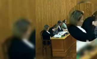 A Vox councilor makes a gesture of "shooting" a socialist in a plenary session in Montcada