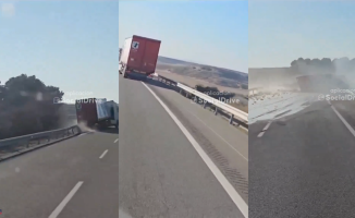 They record a truck transporting beers swerving along the highway and overturning in Huesca