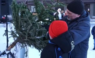 Russian village hosts Christmas tree throwing contest