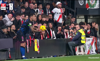 A Rayo Vallecano fan puts his finger in Lucas Ocampos's ass in the middle of the game